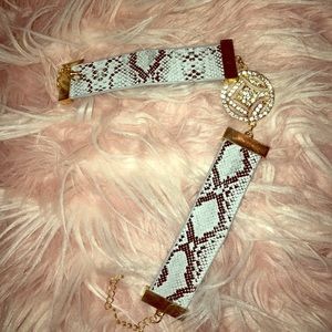 Snake print and crystal choker.